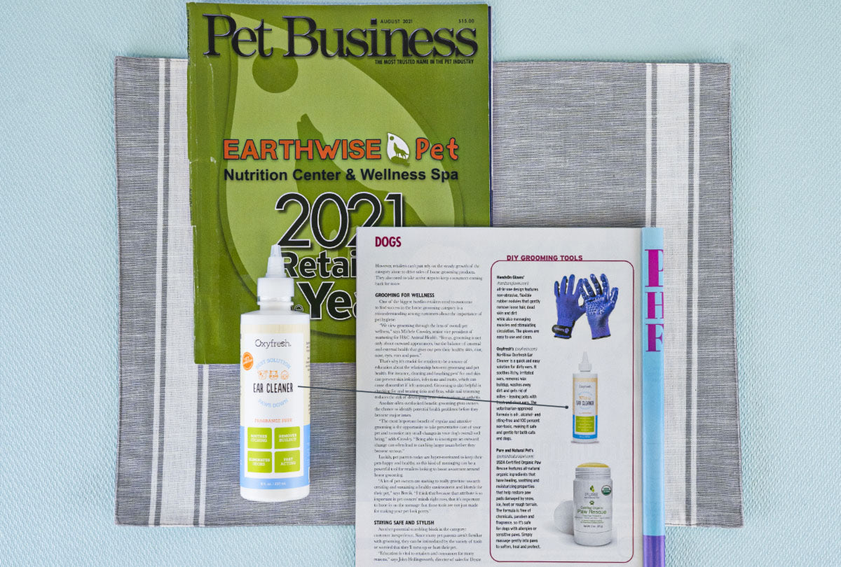 oxyfresh pet ear cleaner next to article in Pet Business magazine