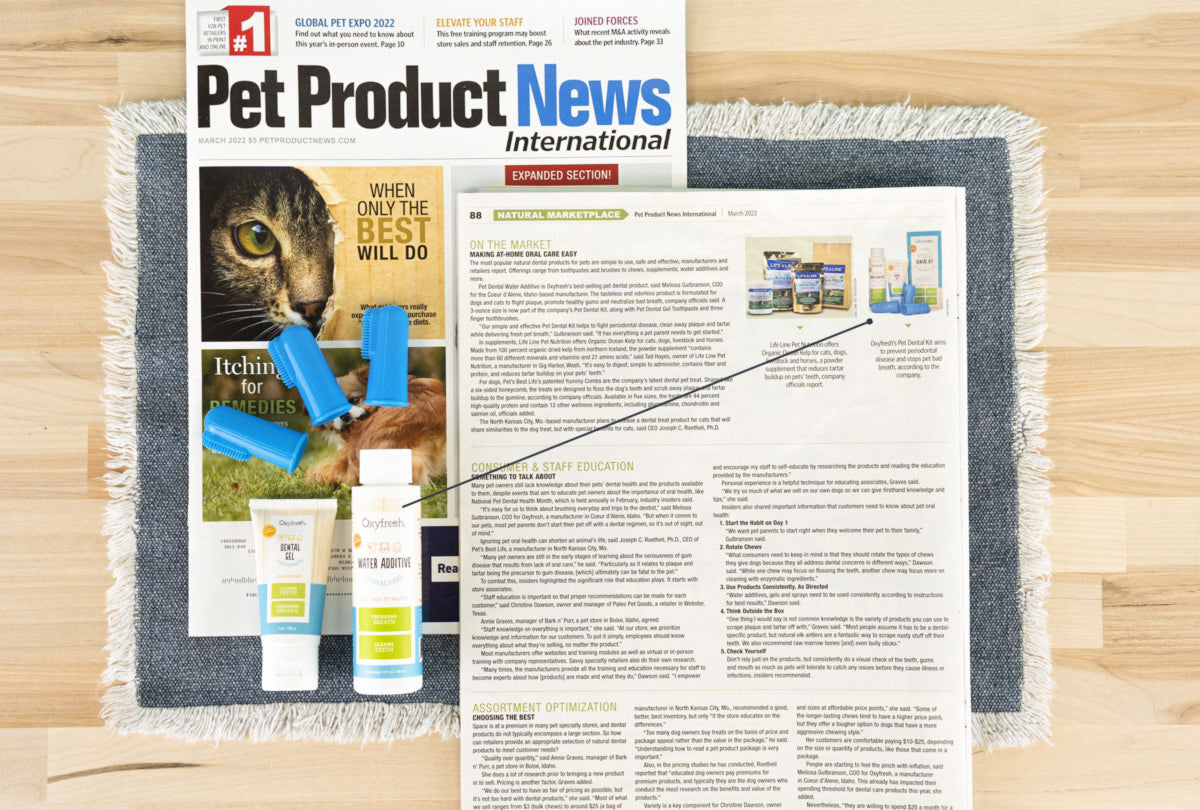 oxyfresh pet dental kit next to article in Pet Product News magazine