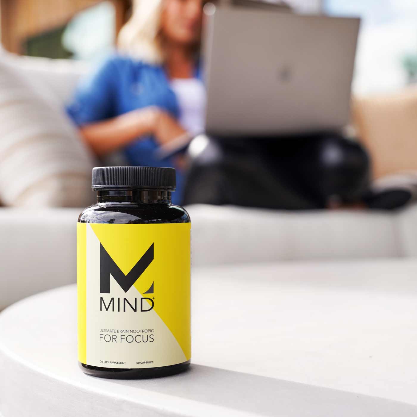 Woman-working-from-home-boosting-her-concentration-with-oxyfresh-mind-brain-boost-nootropics-supplements-for-focus-and-memory